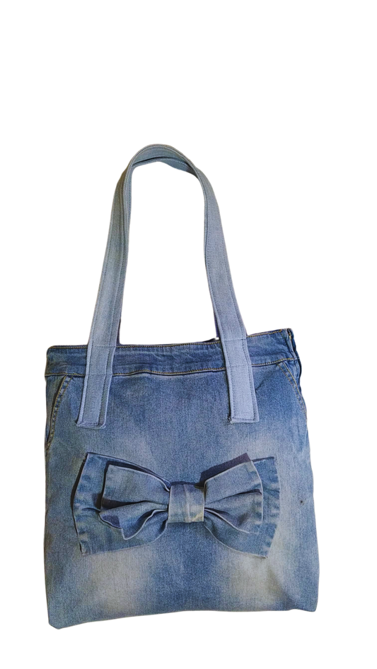 bolso de hombro claro con moño