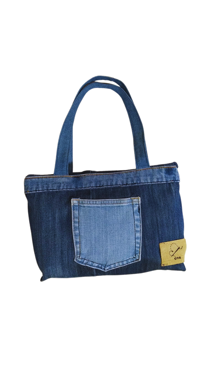 bolso de mano formato cuadrado